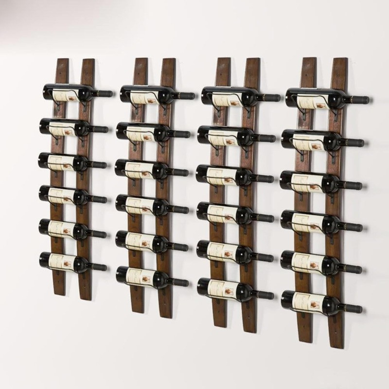 Wall-mounted wooden wine racks with bottles displayed in rows